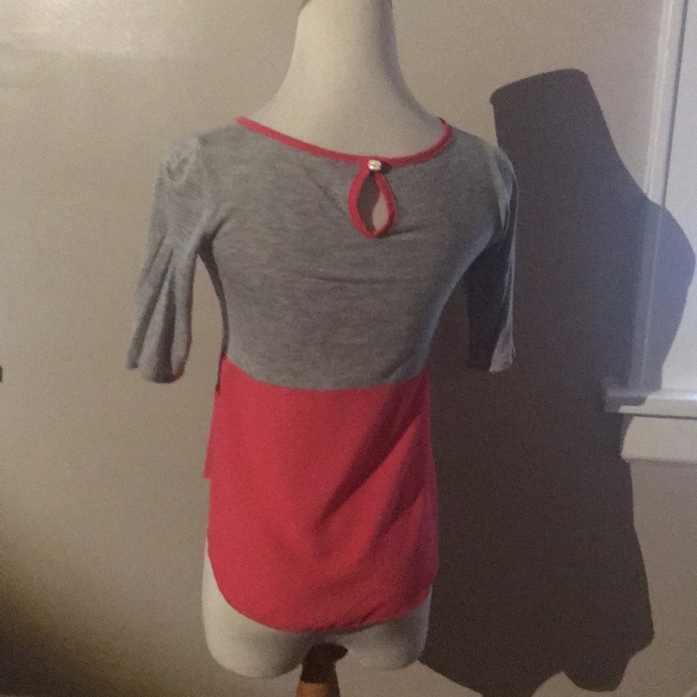 A pink and gray shirt